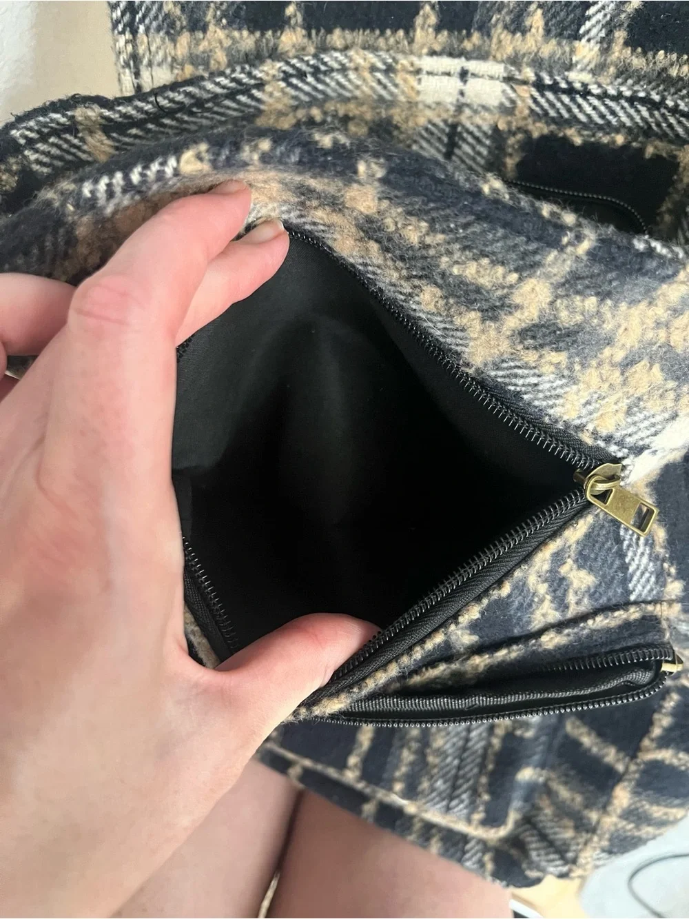 Natural Reflections black and beige plaid backpack